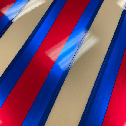 Close-up of red and blue striped pattern on a surface