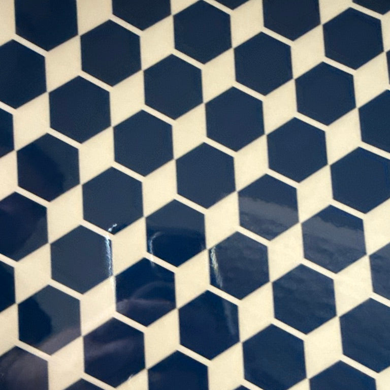 Hexagonal blue tiles on a white background