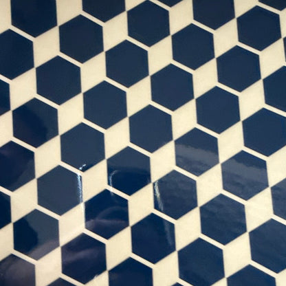 Hexagonal blue tiles on a white background