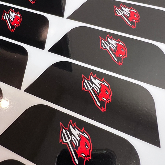 Black decals with red and white logos on a white background