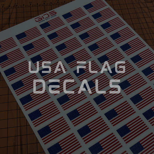 Sheet of USA flag decals on a cutting mat with 'GDS' branding.